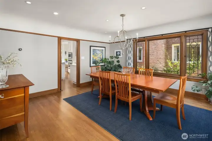 The formal dining space flows seamlessly to the kitchen, offering abundant room for entertaining.