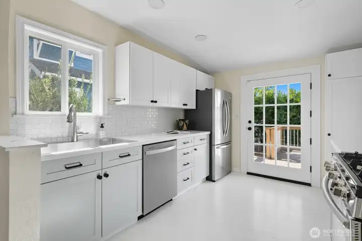 Easy access to the backyard and deck make dining al fresco an easy tradition.