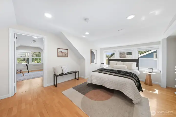 Primary suite upstairs is your own private getaway.