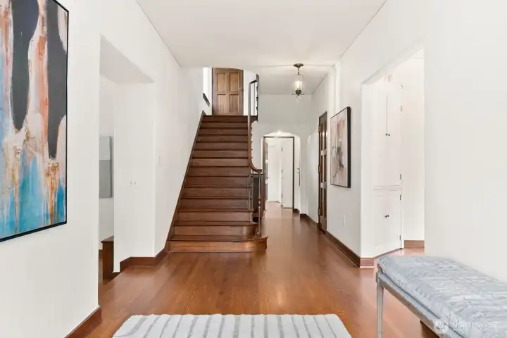 Entry with Siberian oak and rought iron  staircase