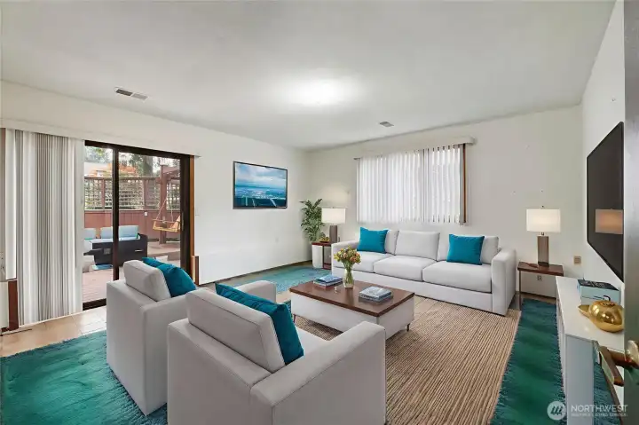Virtually Staged Family Room on lower level. Slider out to deck and backyard