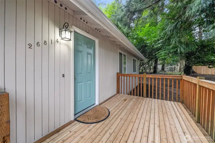 Deck entrance has new deck boards.