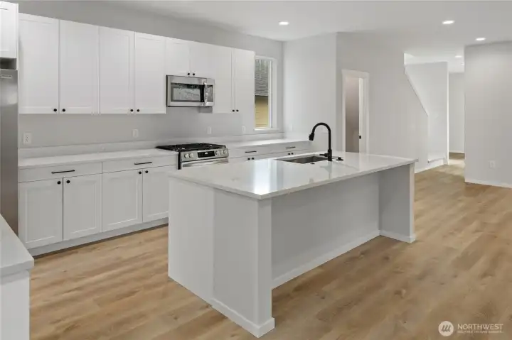 Photos, plans and elevations may be examples representing the community, community  amenities, homes or artist’s renderings that may not accurately represent the actual  condition of a homesite or home as constructed, and may also contain options and  upgrades which are not included in the sale. Trailside Homes reserves the right to make  changes to floor plans, specifications, dimensions, design and elevations without prior  notice. Stated dimensions and square footage, if applicable, are estimated and should  not be used as representations of the home’s actual size