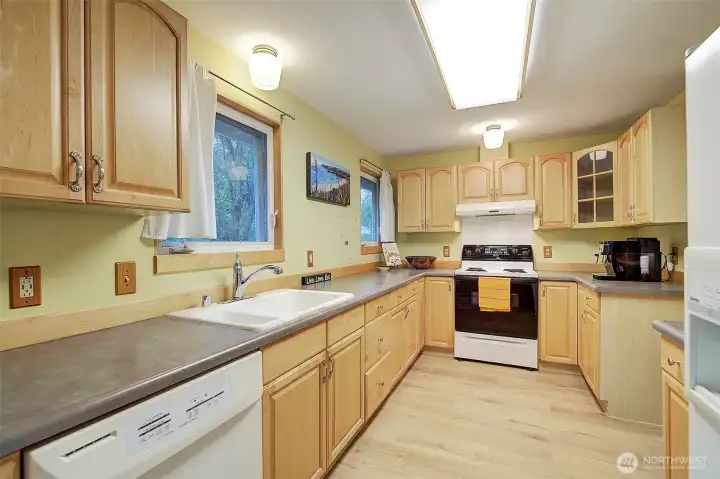 Kitchen has two large windows for more light