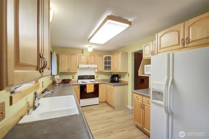 Kitchen has newly installed waterproof LVP flooring