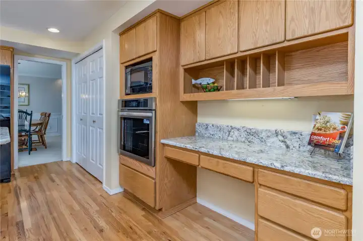 Maximize your organization with a spacious pantry and a convenient built-in desk area, the perfect command center.