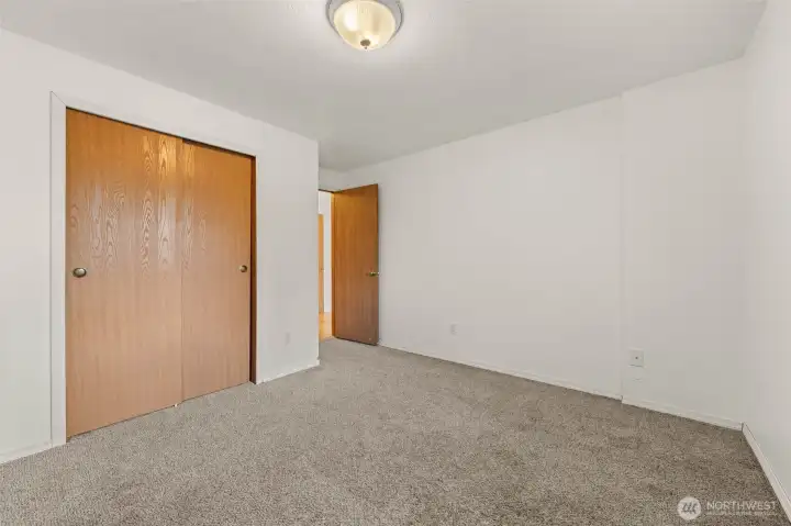 Bedroom 2, off living room, overlooking front yard