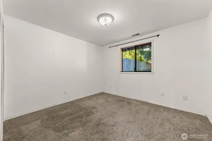 Bedroom 3, off living room, overlooking back yard