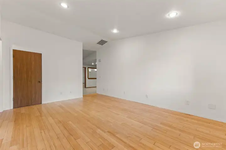 Living room, leading to kitchen and dining