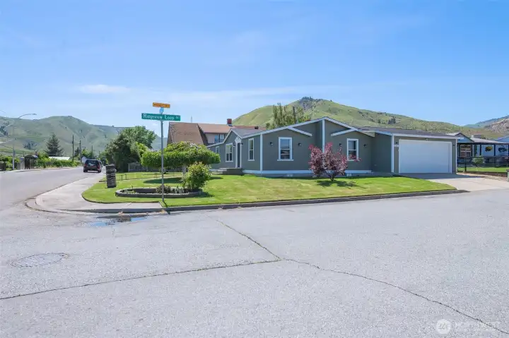 Situated on a corner lot for the advantage of privacy as well as additional street parking!