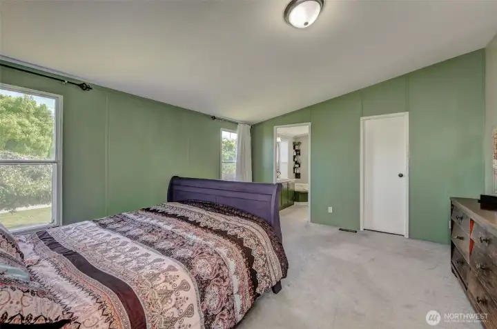 Primary provides space for all of your furnishings, as well has an oversized walk-in closet (closed door) and well-appointed Primary Bath. Room freshly painted!