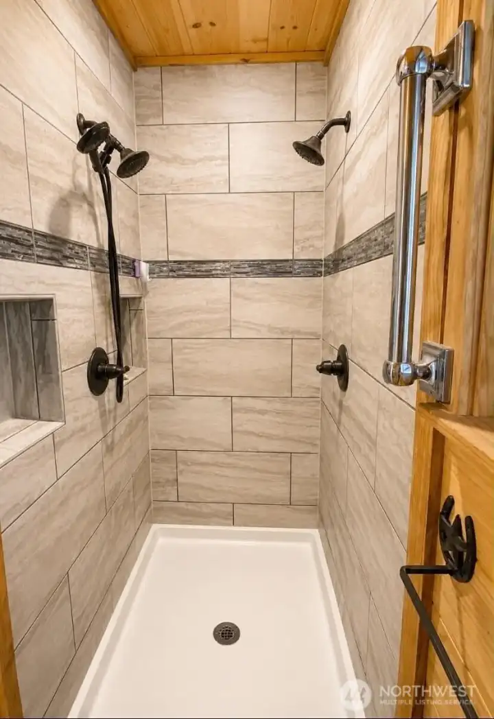 Thoughtfully designed dual-head shower creates a relaxing retreat at home. Thoughtfully designed dual-head shower creates a relaxing retreat at home.