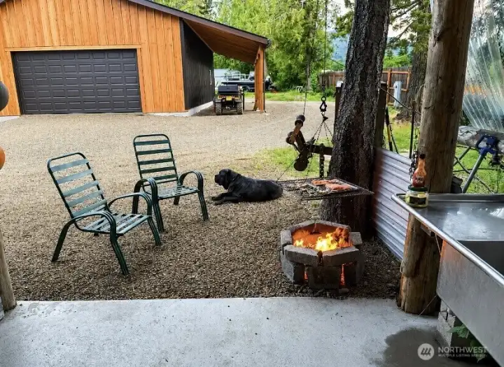 Rustic outdoor cooking area at processing station. Rustic outdoor cooking area at processing station.