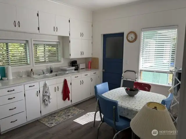 Eat-in-kitchen with newer appliances.