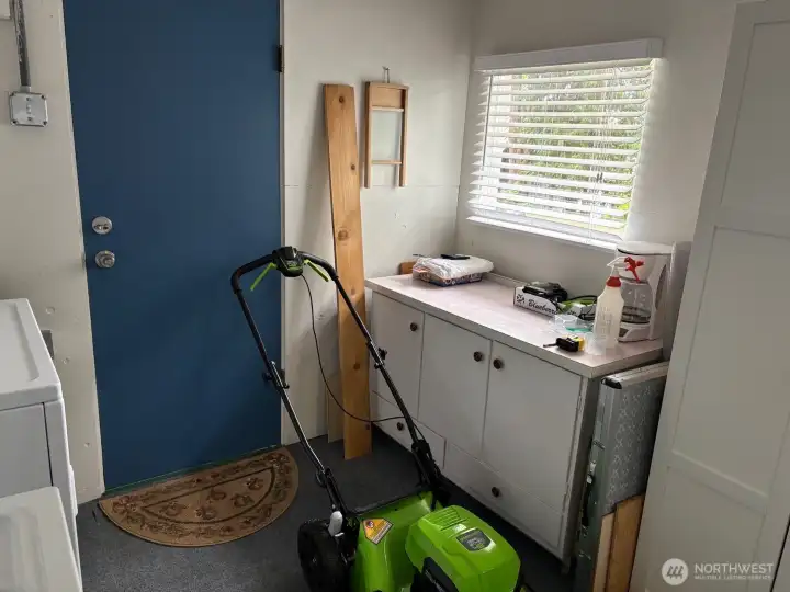Storage cabinets in utility room.