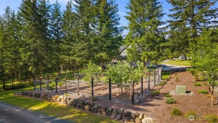 Quiet drive with an orchard that welcomes.