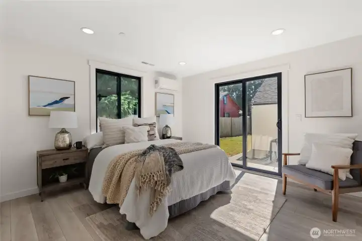 Primary bedroom on main level w/ 3/4 bath en suite