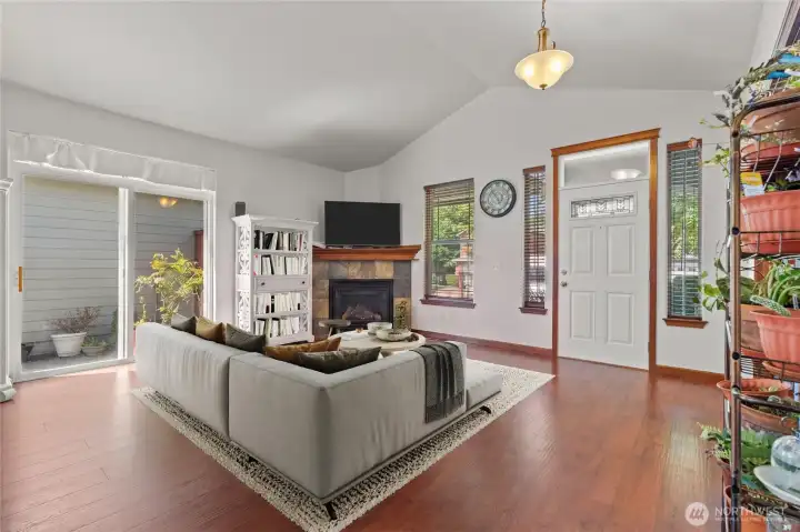 Living Room with Vaulted Ceilings (partially digitally staged) Living Room with Vaulted Ceilings (partially digitally staged)