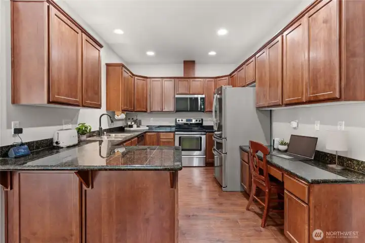 Kitchen with Eating Bar and Home Office Space (partially digitally staged) Kitchen with Eating Bar and Home Office Space (partially digitally staged)