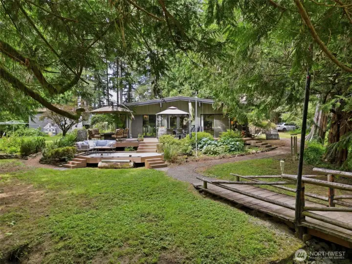 Front exterior showcasing the peaceful, established rural lifestyle. Front exterior showcasing the peaceful, established rural lifestyle.