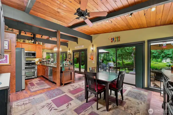 Beautifully updated kitchen blending modern amenities with a cozy, rustic cabin vibe. Beautifully updated kitchen blending modern amenities with a cozy, rustic cabin vibe.