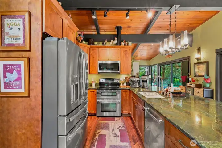 Premium kitchen finishes including elegant granite counters and stainless steel appliances. Premium kitchen finishes including elegant granite counters and stainless steel appliances.