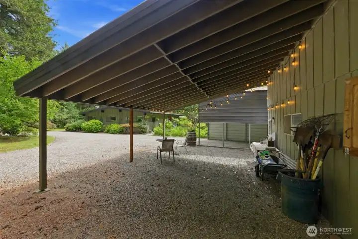 Additional carport spaces and covered shelter areas provide exceptional utility across the acreage. Additional carport spaces and covered shelter areas provide exceptional utility across the acreage.
