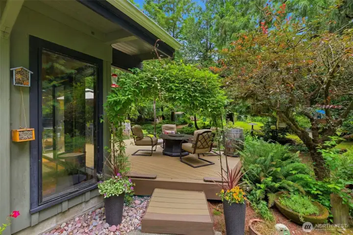 Seamless indoor-outdoor flow leads to this lovely porch area, ideal for summer dining and entertaining. Seamless indoor-outdoor flow leads to this lovely porch area, ideal for summer dining and entertaining.