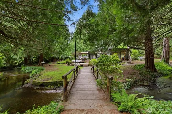 Stroll across your private wooden bridge and enjoy seasonal salmon-spawning right on the property. Stroll across your private wooden bridge and enjoy seasonal salmon-spawning right on the property.