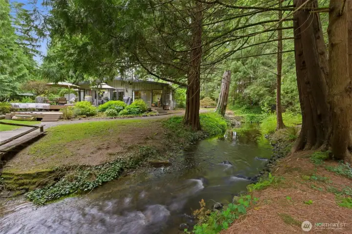 Enjoy 165 feet of Minter Creek babbling directly through your private backyard. Enjoy 165 feet of Minter Creek babbling directly through your private backyard.