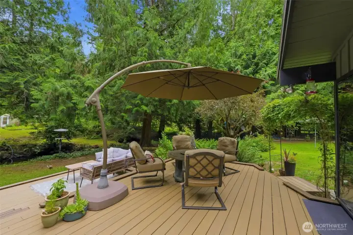 Seamless indoor-outdoor flow makes this spacious back porch an extension of the home's living space. Seamless indoor-outdoor flow makes this spacious back porch an extension of the home's living space.