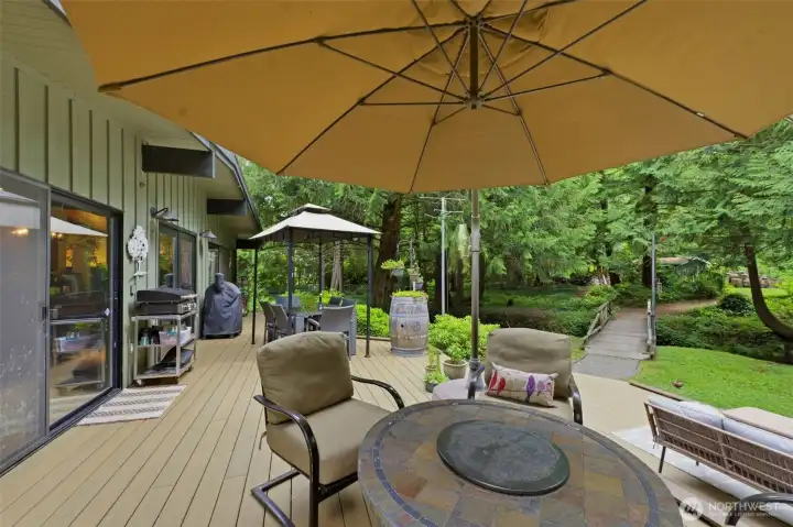 Another view of the newer composite deck, highlighting its spacious layout and premium, low-maintenance materials. Another view of the newer composite deck, highlighting its spacious layout and premium, low-maintenance materials.