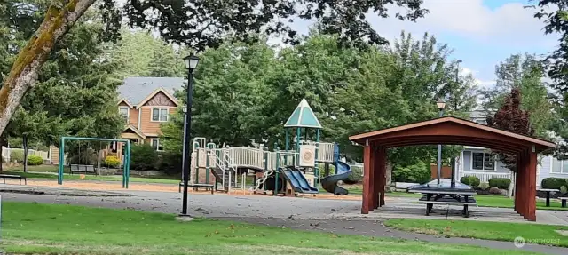 Community Park Playground & Covered BBQ areas.