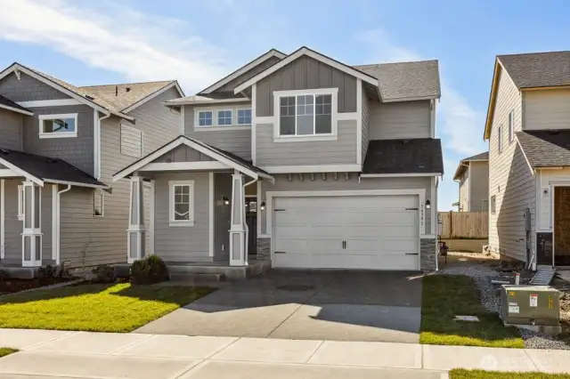 Photo is of the same floorplan in another community. Elevation and colors will vary