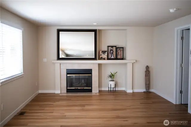 Family room with gas fireplace and slider to the deck