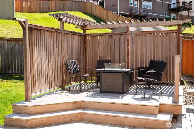 The pergola and deck are perfect for a summer BBQ
