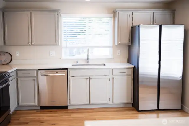 Sunny window over the kitchen sink & a brand new Stainless refrigerator
