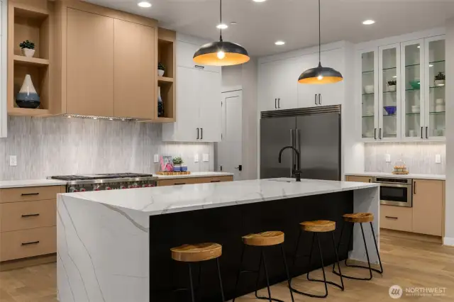 Chef's appliance package with a wolf 48" range and 66" wide refrigerator