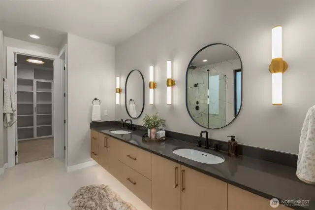 Primary bath with dual sinks and heated tile floors