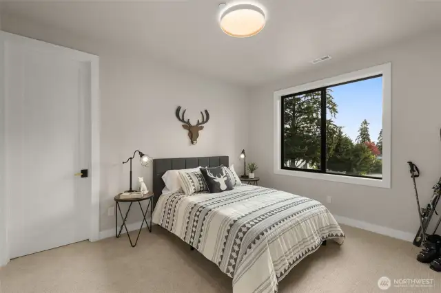 Spacious secondary bedrooms with walk in closets