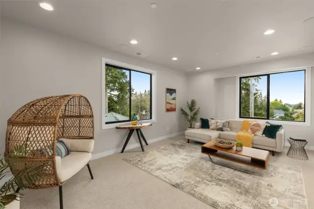 Large media room with built in speakers for 5.1 surround sound