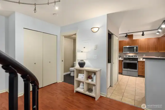 Open area with seamless flow between living area and kitchen.