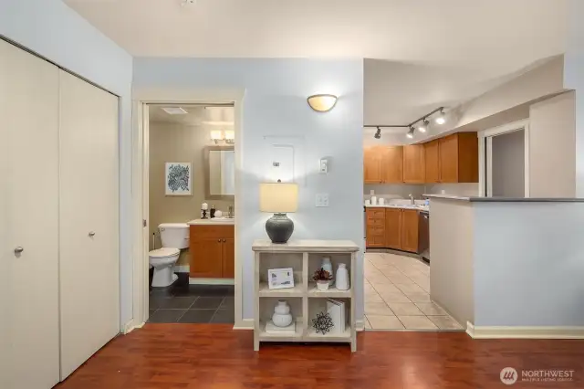 Side closet near powder room offering additional storage.