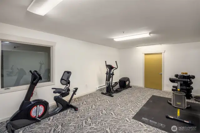 Building amenities, featuring gym on same floor as unit.