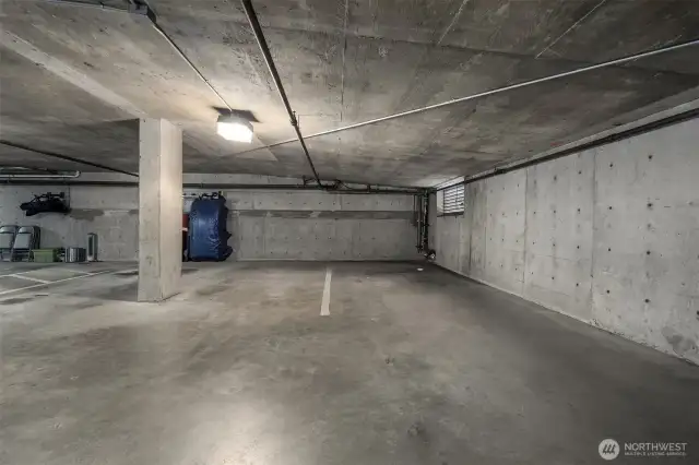 Assigned parking space in attached parking garage.