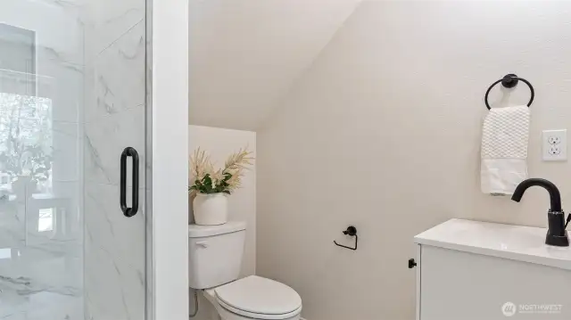 Photos for reference.  Same floorplan, similar features. 3/4 bath off lower level room has tile shower and flooring.