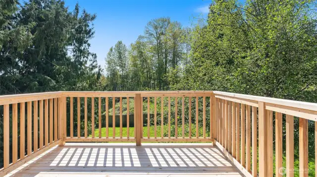 Photos for reference.  Same floorplan, similar features. Spacious deck on main level.