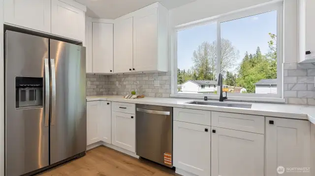 Photos for reference.  Same floorplan, similar features. Appliances include the fridge.