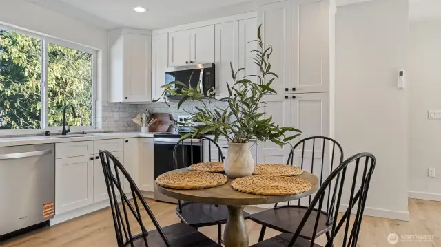 Photos for reference.  Same floorplan, similar features. Eating area off kitchen.