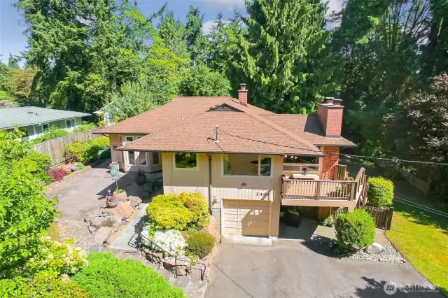 Well maintained home on a large lot with ample parking for cars, RV, Boat